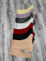 Top de fiesta de lurex con un solo hombro.