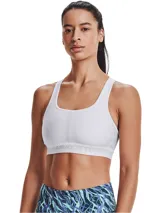 Top deportivo Under Armour Crossback Mid Bra, color blanco, de diseño liso con tirantes cruzados en la espalda y banda elástica inferior con el logotipo de la marca. Confeccionado en tejido HeatGear de doble capa con copas suaves y extraíbles.