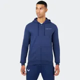 Campera con cierre frontal, capucha con cordón ajustable y bolsillos laterales. Color negro con el logo de Castore en blanco en el pecho.