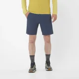 Short de senderismo Salomon modelo Wayfarer Ease, color azul marino, con bolsillos laterales y tejido elástico en 4 direcciones.