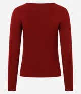 Suéter de punto ajustado con escote canoa y mangas largas. Presenta una superficie lisa y acabado clean, confeccionado en una mezcla de viscosa, poliéster y poliamida.