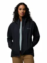 Campera cortaviento impermeable y transpirable Columbia Trailborne 2.5L de color negro, con capucha integrada, cierre frontal bidireccional y bolsillos con cierre.