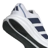 Championes de running Adidas Galaxy 7, color blanco con detalles en azul marino. Presentan un diseño de malla transpirable, cierre con cordones y suela con tecnología Cloudfoam para mayor amortiguación.