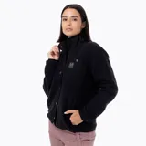 Chaqueta polar tipo sherpa color negro, con cierre frontal de botones a presión, cuello alto y bolsillo en el pecho con parche de la marca. Presenta detalles reforzados en nylon y puños elásticos.