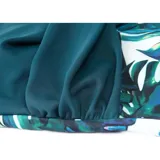 Malla entera de color verde oscuro, combinada con un diseño floreado en la parte inferior. Presenta escote halter cruzado y fruncidos en la zona del abdomen.