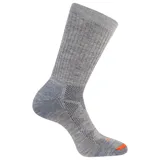 Medias de caña alta de punto gris melange con refuerzos y detalles en naranja en la puntera.