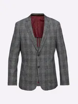 Saco de paño gris con diseño a cuadros, cuello con solapas, bolsillos de plastrón en pecho y cadera, mangas con coderas en contraste de color, forro estampado y aberturas en espalda.