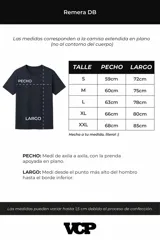 Remera oversize de algodón con efecto lavado gastado, cuello redondo y mangas cortas. Presenta un diseño circular estampado en el pecho con el texto VCP CONCEPT STUDIO.