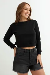 Sweatshirt gris claro de algodón, de corte clásico y manga larga.