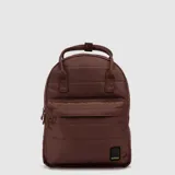 Mochila Bubba modelo Montreal de diseño acolchado, color celeste, con compartimento principal con cierre, bolsillo frontal con cierre y correas ajustables. Incluye etiqueta de marca en la parte inferior.
