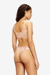 Tanga de algodón elástico gris oscuro con efecto metalizado y estampa sutil tipo foil, con banda elástica en la cintura con el logo de la marca.