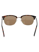Lentes de sol RKF modelo Positano, con armazón estilo clubmaster de acetato con estampado carey y detalles metálicos dorados, y cristales polarizados color marrón.