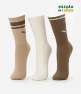 Kit de tres pares de medias deportivas Puma de caña larga, confeccionadas en tejido de algodón suave. El set incluye un par color beige con rayas marrones, un par color blanco liso y un par color marrón con detalle de rayas en el puño. Todas presentan el logo de la marca bordado en el lateral.