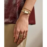 Reloj Skagen modelo Hagen Micro, con caja rectangular y malla de acero inoxidable color dorado.