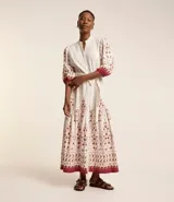 Vestido chemise midi de viscolino con estampado floral, manga abullonada 3/4 y lazo delantero.