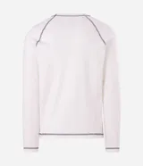 Remera de manga larga confeccionada en tejido de algodón acanalado (ribana) color blanco. Presenta costuras contrastantes en color oscuro, cuello redondo y estampa frontal con lettering en estilo gótico.