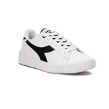 Championes urbanos Diadora modelo Set, color blanco con logo lateral en negro. Presentan suela de plataforma gruesa con textura acanalada en el borde.