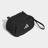 Bolso deportivo pequeño tipo pouch de color negro, con forma ovalada y logo Badge of Sport de Adidas reflectante en el centro. Cuenta con correa ajustable y removible.
