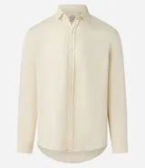 Camisa de manga larga confeccionada en mezcla de lino y algodón, con cuello tipo padre y cierre frontal parcial con botones. Presenta un corte amplio y cómodo, ideal para un estilo casual y fresco.