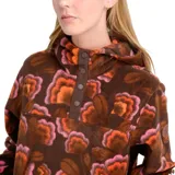 Canguro de polar con estampado floral en tonos marrones, naranjas y rosas. Presenta cuello alto con cierre de botones a presión, bolsillos laterales y diseño de calce regular.