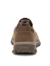 Zapato slip on Caterpillar modelo Threshold, color marrón, confeccionado en cuero de grano completo con elásticos laterales y suela de goma resistente.