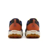 Championes de trail running New Balance Fresh Foam X Hierro v7, con capellada de malla amarilla y detalles en azul, naranja y negro. Suela Vibram® Megagrip.