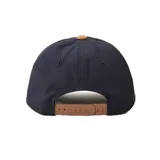 Gorra de béisbol azul marino con visera de pana color marrón y logo ovalado de Rip Curl bordado en el frente.