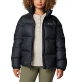 Campera tipo puffer Columbia para mujer, color negro, con cierre frontal completo, cuello alto con protector de mentón, bolsillos laterales con cierre y puños elásticos. Cuenta con aislamiento térmico sintético y tejido exterior impermeable.