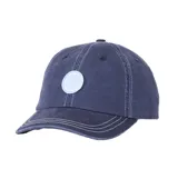 Gorra Rip Curl modelo Sg Washed, color azul con efecto deslavado, costuras blancas visibles y parche redondo celeste en el frente.