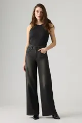 Jean de tiro alto con diseño wide leg, color negro con efecto deslavado, confeccionado en denim con bajo nivel de elasticidad.