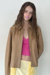 Top de algodón con cuello halter y escote en pico profundo, de diseño ajustado y sin mangas.