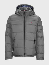 Campera puffer acolchada Tommy Hilfiger de color gris con capucha ajustable, cierre frontal de cremallera, bolsillos laterales con cierre y logo bordado en el pecho.