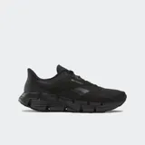 Championes Reebok Zig Dynamica 5, color negro, con parte superior de malla y capas de TPU, entresuela FuelFoam y suela de goma con diseño en zigzag.