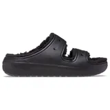 Sandalias tipo mule negras con plataforma, forradas con material afelpado negro en las tiras y el interior. Presentan dos tiras ajustables con hebillas y orificios para dijes Jibbitz™.