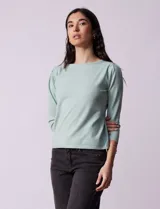 Buzo tejido en hilado fino color verde agua, marca Vila Milano. Manga ¾ con pliegue en hombro y escote a la base.