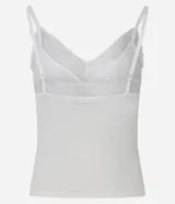 Blusa de pijama seamless color blanco de la marca Lov, confeccionada en poliamida con elastano. Presenta tirantes finos y detalle de encaje en el escote en V.