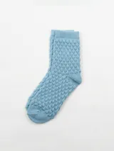 Medias de acrílico color lila con diseño calado.