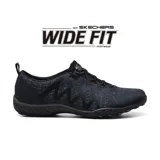 Zapatillas Skechers Relaxed Fit Breathe Easy Infi-Knity Wide Fit, color negro, para mujer. Capellada de tejido Skech-Knit elástico, sin cordones, con plantilla acolchada Skechers Air-Cooled Memory Foam y suela flexible. Horma ancha.