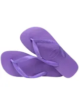 Chinelas Havaianas de diseño clásico, color violeta, con suela texturizada y tiras con logo de la marca en relieve.