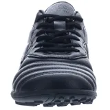 Championes de fútbol Umbro modelo Touch TF, color negro, diseñados para césped sintético. Presentan un diseño monocromático con el logo de la marca en el lateral y suela con tecnología de tracción especializada.