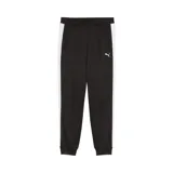 Pantalón deportivo Puma modelo Essentials T7, color negro con franjas laterales blancas y logo de la marca bordado en la pierna izquierda. Cuenta con cintura elástica, bolsillos laterales con cierre y puños acanalados en los tobillos.