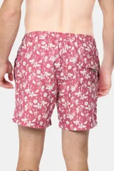 Short de baño celeste con estampado floral blanco, cintura con elástico y cordón regulable, bolsillos laterales y suspensor de malla fina.