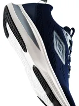 Championes deportivos Umbro modelo Vega para hombre, color azul marino con suela blanca y detalles en gris.