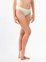 Bombacha clásica color verde claro con cintura elástica con logo de Calvin Klein en blanco.