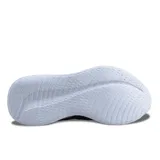 Championes de running New Balance, color negro con detalles en rojo y suela blanca.