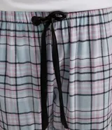 Pantalón de pijama largo de franela con estampado a cuadros, cintura elástica con lazo y tobillos elastizados.