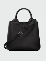Cartera de mano tamaño pequeño Longchamp de la línea Le Roseau, color verde, de diseño estructurado con doble asa y cierre de botón a presión con pasador metálico tubular.