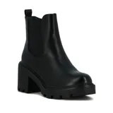 Botas de caña baja color negro, con elástico lateral y taco cuadrado.