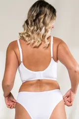 Corset corto blanco con aro, confeccionado en lycra con detalles de microtul con puntos y puntilla elastizada. Breteles elásticos regulables y espalda ancha con broches regulables.