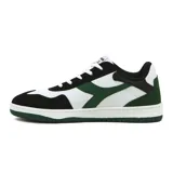 Championes urbanos Diadora modelo Wind, de caña baja, con combinación de colores blanco, negro y verde oscuro. Presentan un diseño inspirado en el skate con puntera y talón en gamuza negra, paneles laterales blancos y el logo Diadora en verde. La suela es blanca con detalle verde en la parte delantera.